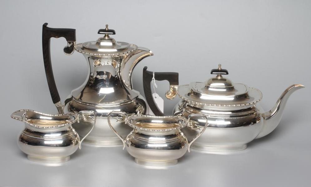 A GEORGE VI SILVER FOUR PIECE TEA SERVICE by Viners Image