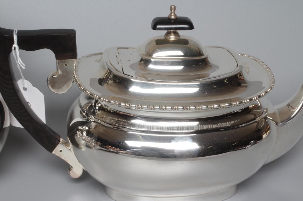 A GEORGE VI SILVER FOUR PIECE TEA SERVICE by Viners Image