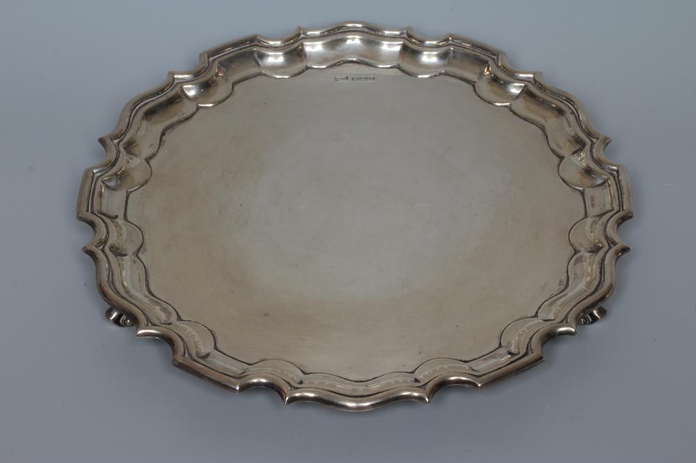 A GEORGE VI SILVER SALVER by Walker & Hall, Sheffield 1936, of shaped circular form with piecrust Image