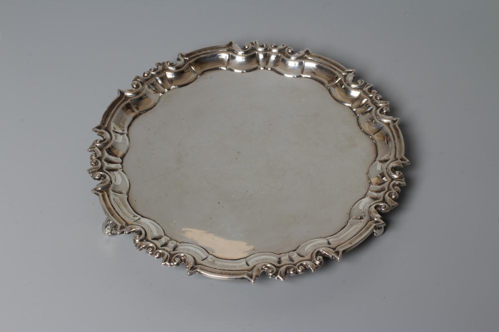 A GEORGE V SILVER WAITER by William Hutton & Sons Ltd., Sheffield 1920, of shaped circular form with Image