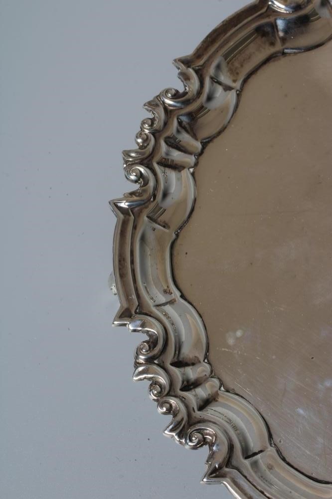 A GEORGE V SILVER WAITER by William Hutton & Sons Ltd., Sheffield 1920, of shaped circular form with Image