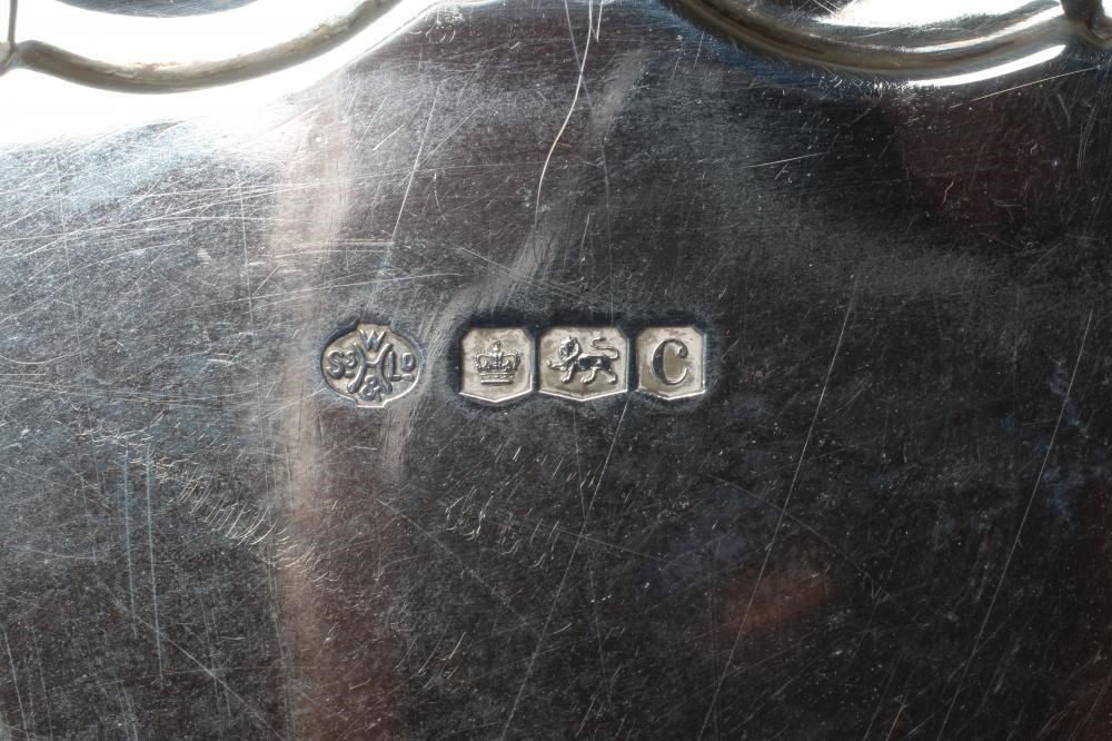 A GEORGE V SILVER WAITER by William Hutton & Sons Ltd., Sheffield 1920, of shaped circular form with Image