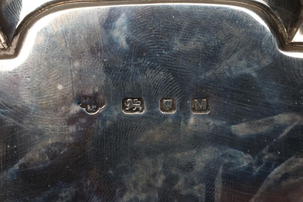 A GEORGE VI SILVER WAITER by Goldsmiths & Silversmiths, London 1947, of canted square form with Image