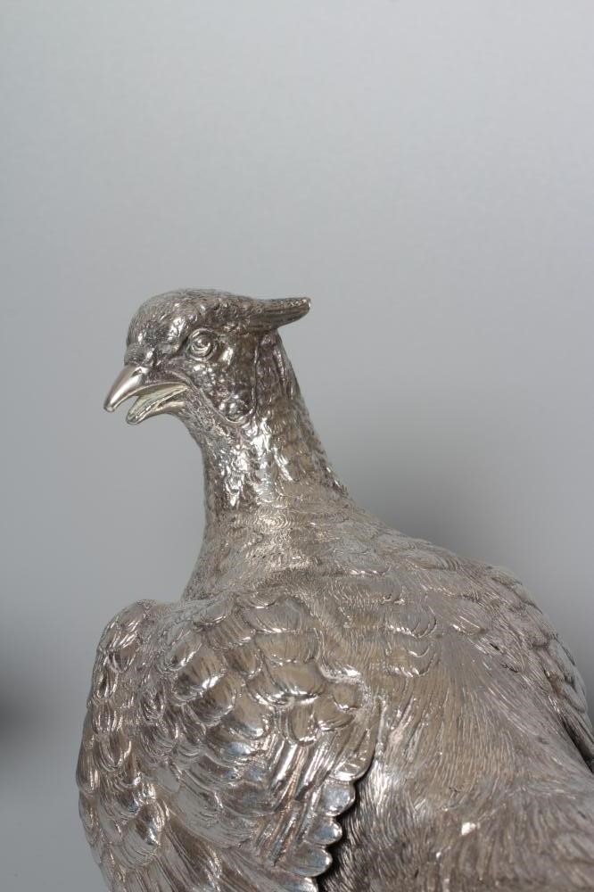A PAIR OF ELIZABETH II SILVER PHEASANTS by Mappin & Webb Image