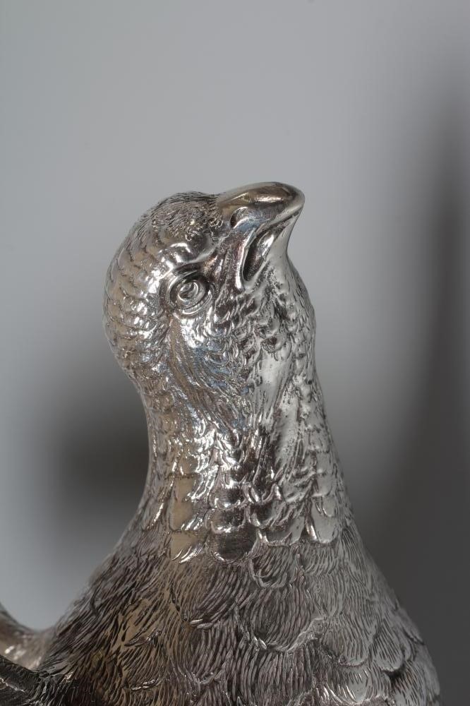 A PAIR OF ELIZABETH II SILVER PHEASANTS by Mappin & Webb Image