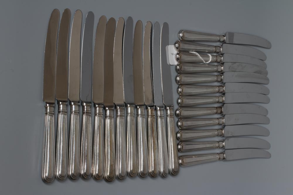 AN ELIZABETH II SET OF TWELVE EACH SILVER TABLE AND DESSERT KNIVES by William Yates Ltd., Sheffield Image