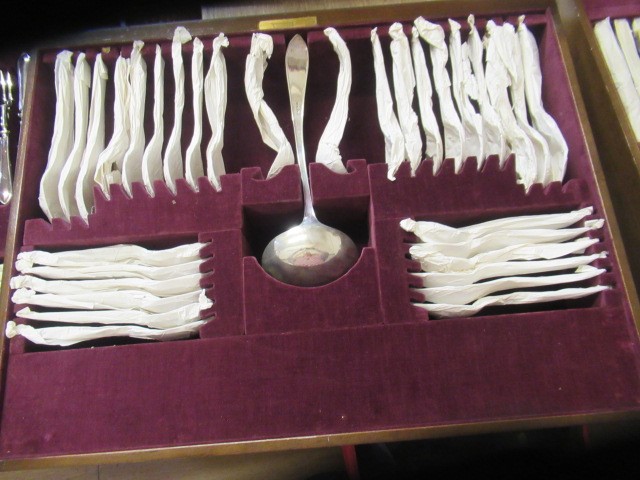 AN ELIZABETH II FULL AND COMPLETE SILVER SANDRINGHAM PATTERN TABLE SERVICE FOR TWELVE PLACE SETTINGS Image