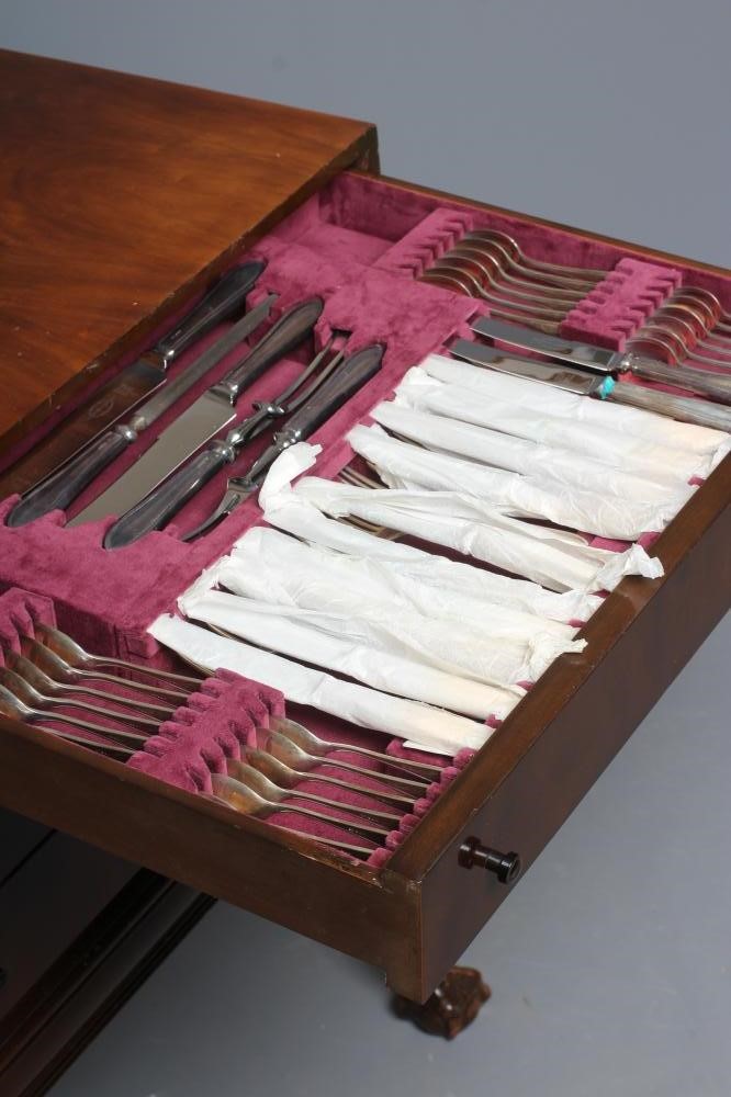 AN ELIZABETH II FULL AND COMPLETE SILVER SANDRINGHAM PATTERN TABLE SERVICE FOR TWELVE PLACE SETTINGS Image