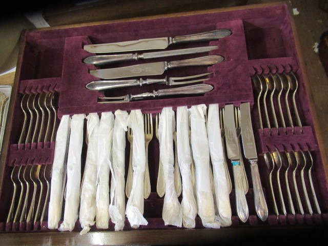 AN ELIZABETH II FULL AND COMPLETE SILVER SANDRINGHAM PATTERN TABLE SERVICE FOR TWELVE PLACE SETTINGS Image
