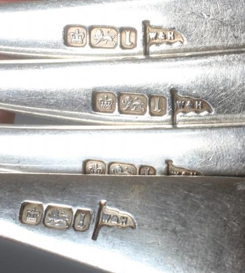 AN EDWARDIAN SILVER RAT TAIL PATTERN PART TABLE SERVICE by Walker & Hall Image