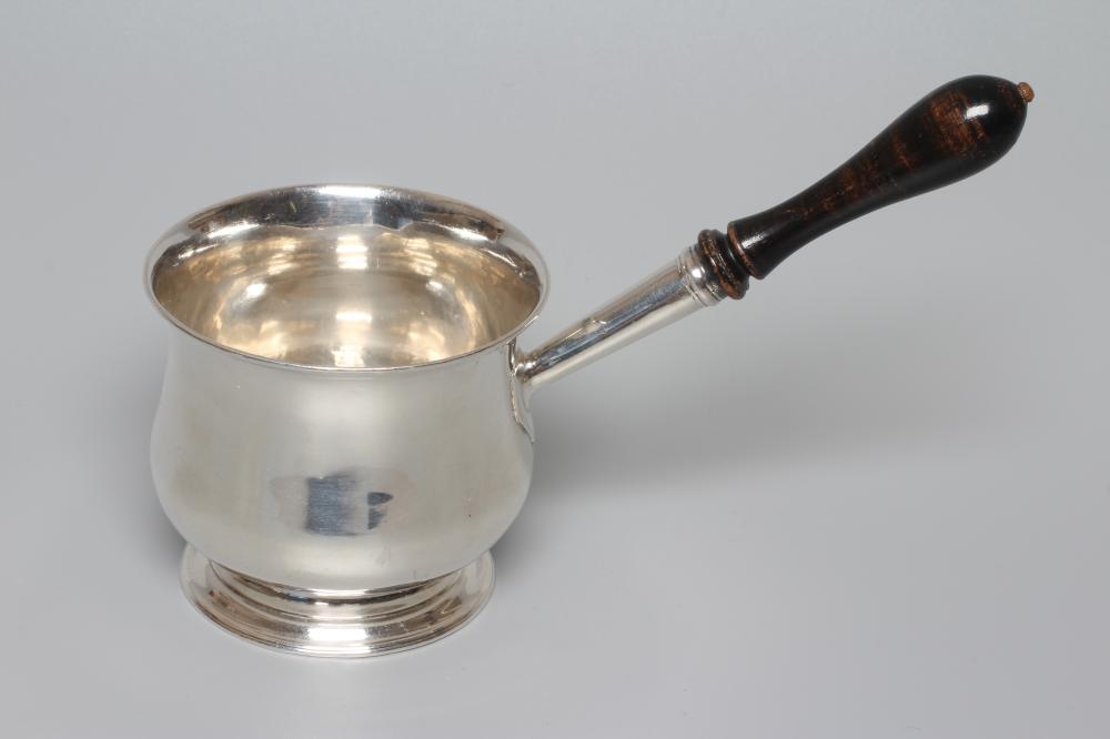 A GEORGE III SILVER BRANDY WARMER possibly by Walter Brind, London 1777, of baluster form, engraved Image