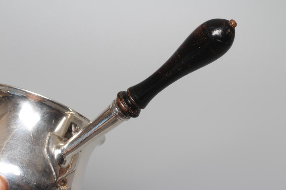 A GEORGE III SILVER BRANDY WARMER possibly by Walter Brind, London 1777, of baluster form, engraved Image