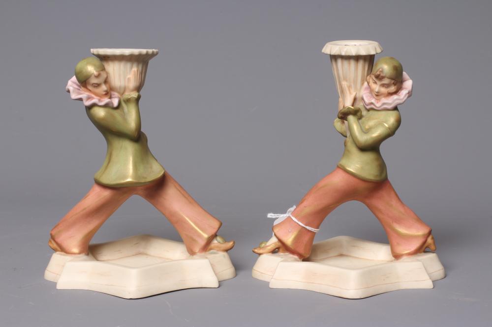 A PAIR OF ART DECO ROYAL DUX FIGURAL CANDLESTICKS modelled as Pierrot and Pierrette Image