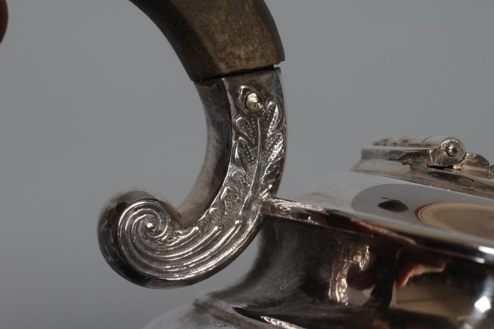 AN EDWARDIAN SILVER TEAPOT by James Dixon & Sons Ltd. Image