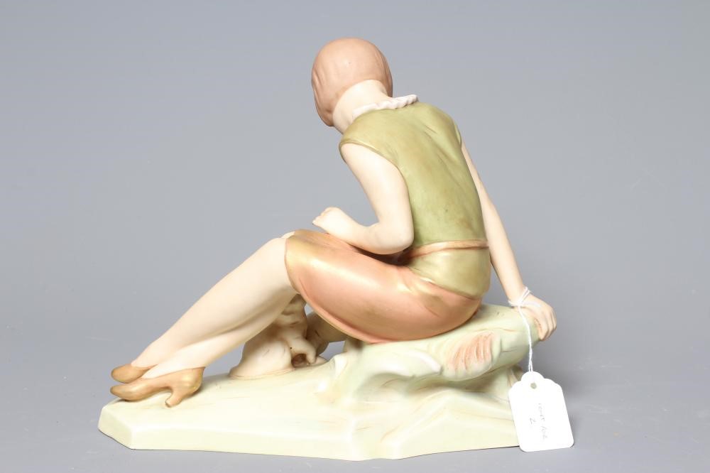 AN ART DECO ROYAL DUX FIGURE modelled as a seated young girl playing with two kittens at her side on Image