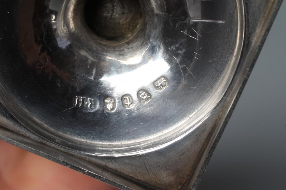 A LATE GEORGE III SILVER HELMET JUG by Robert Hennell, London 1794, with high loop handle on square Image