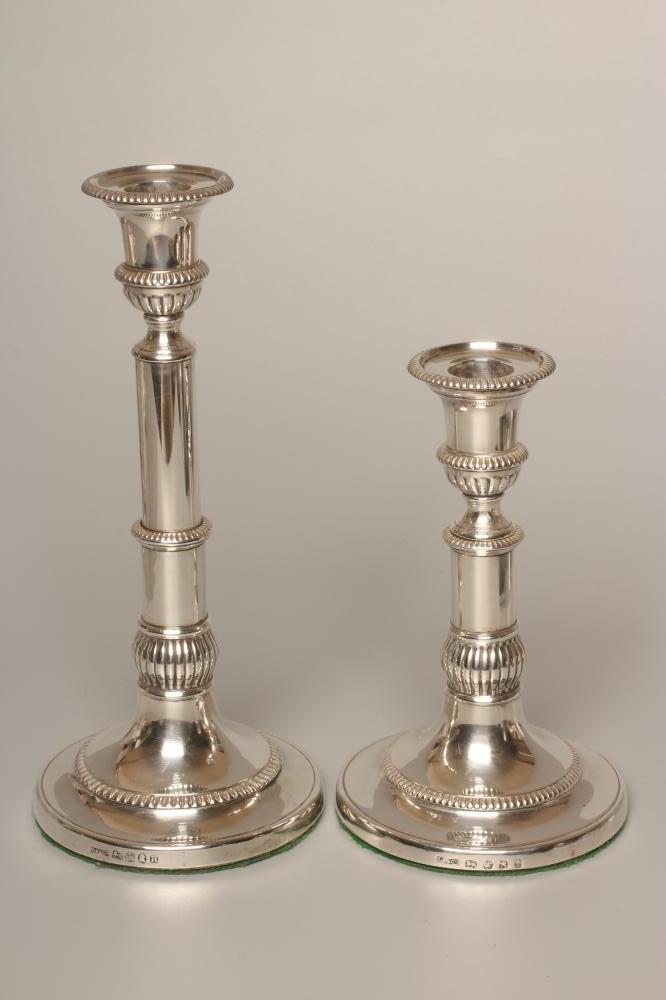 A COMPOSITE PAIR OF GEORGE III SILVER TELESCOPIC CANDLESTICKS by John Roberts & Sons Image
