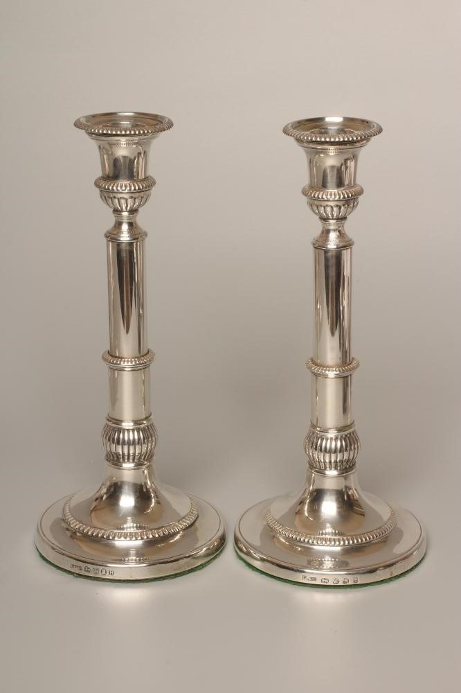A COMPOSITE PAIR OF GEORGE III SILVER TELESCOPIC CANDLESTICKS by John Roberts & Sons Image