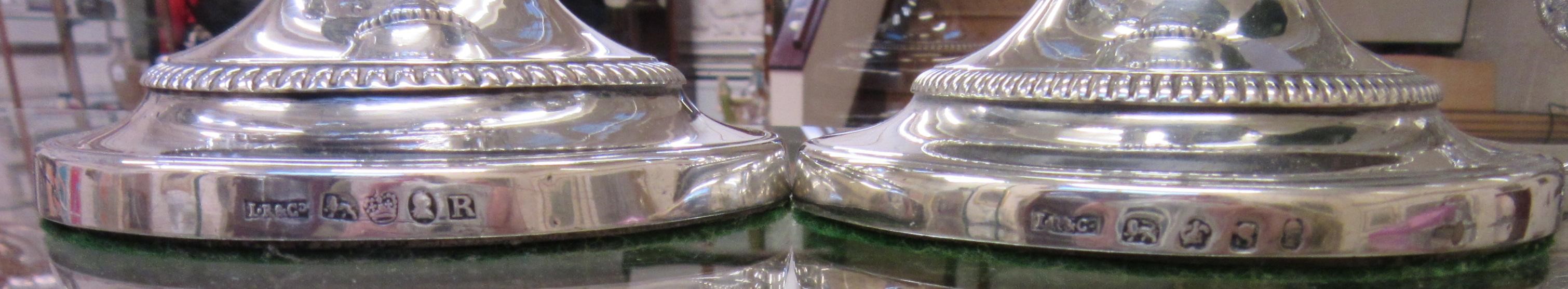 A COMPOSITE PAIR OF GEORGE III SILVER TELESCOPIC CANDLESTICKS by John Roberts & Sons Image