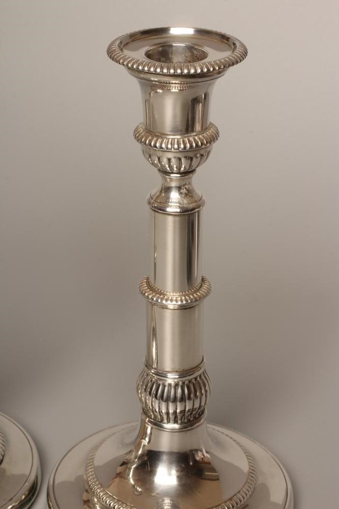 A COMPOSITE PAIR OF GEORGE III SILVER TELESCOPIC CANDLESTICKS by John Roberts & Sons Image