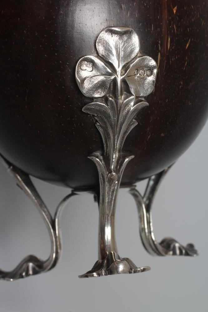 AN EARLY VICTORIAN SILVER MOUNTED COCONUT BASKET by the Barnards Image