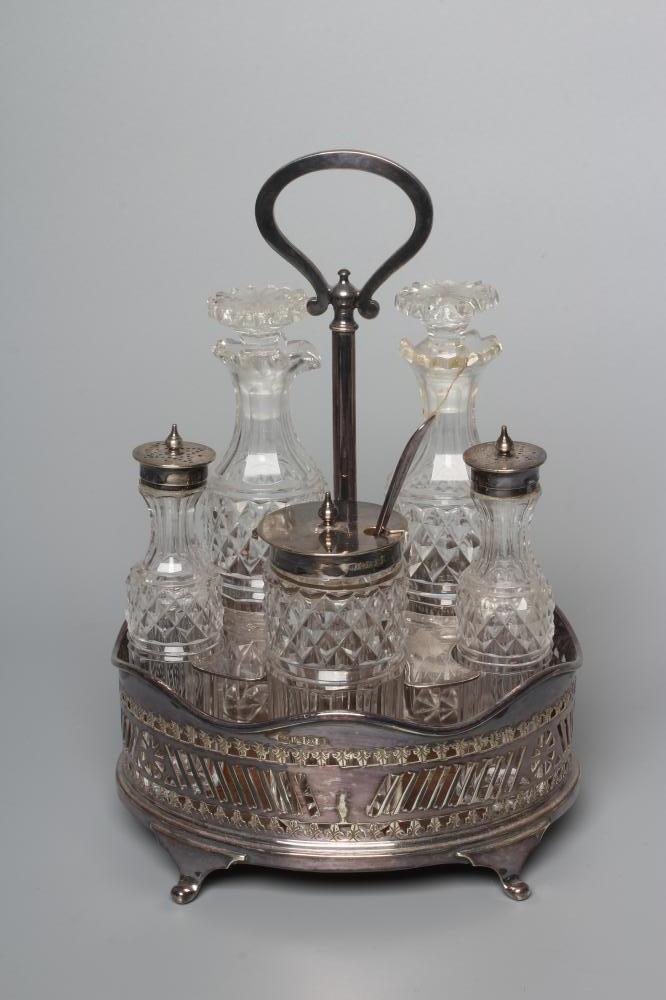 A LATE VICTORIAN SILVER FIVE BOTTLE CRUET STAND by Atkin Brothers Image