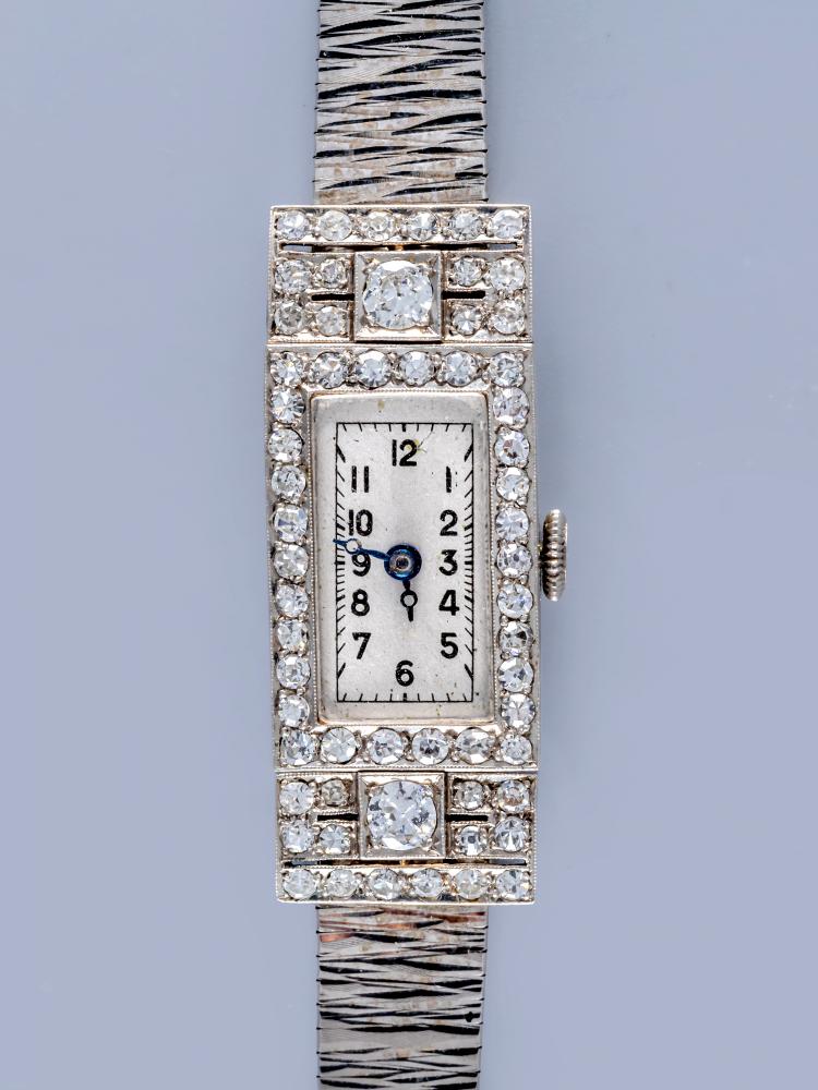 AN ART DECO DIAMOND SET PLATINUM COCKTAIL WATCH Image