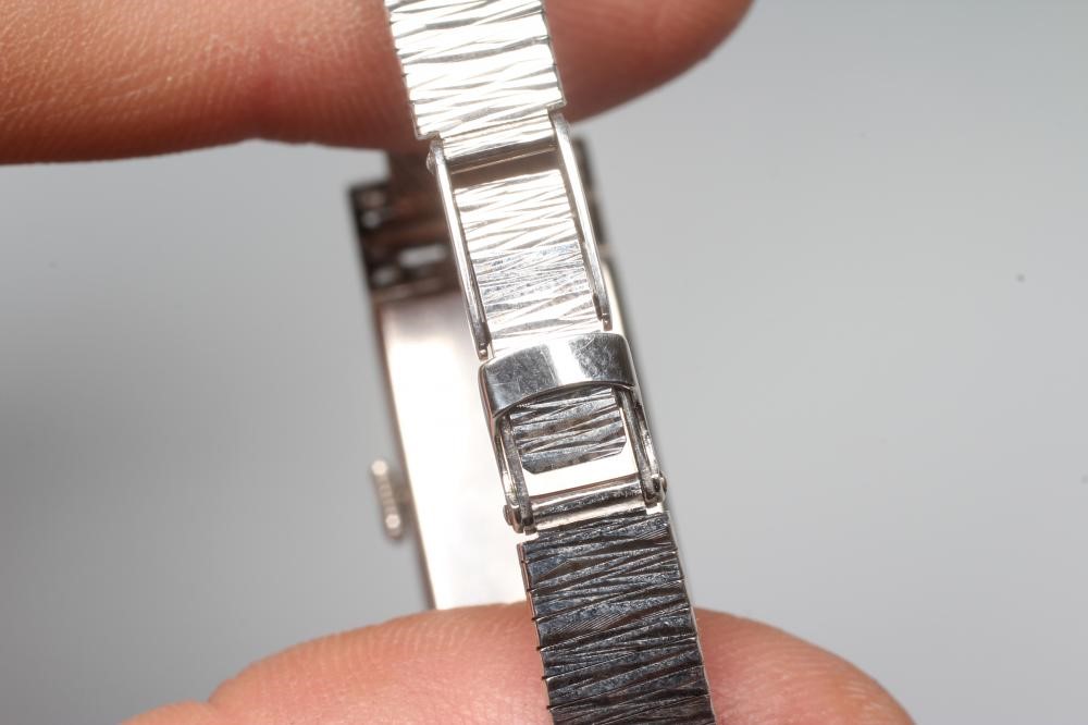 AN ART DECO DIAMOND SET PLATINUM COCKTAIL WATCH Image