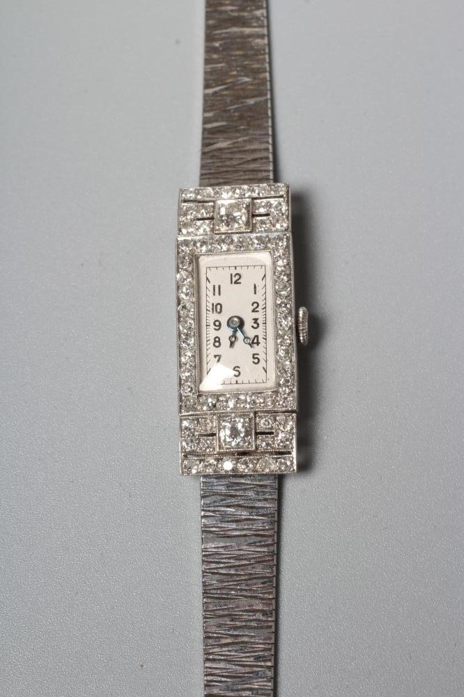 AN ART DECO DIAMOND SET PLATINUM COCKTAIL WATCH Image