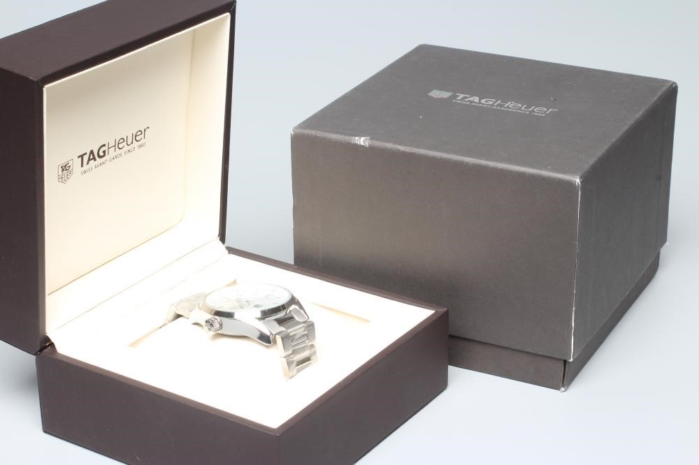 A GENTLEMAN'S TAG HEUER CARRERA CALIBRE 5 AUTOMATIC WRISTWATCH the silvered dial with applied metal Image