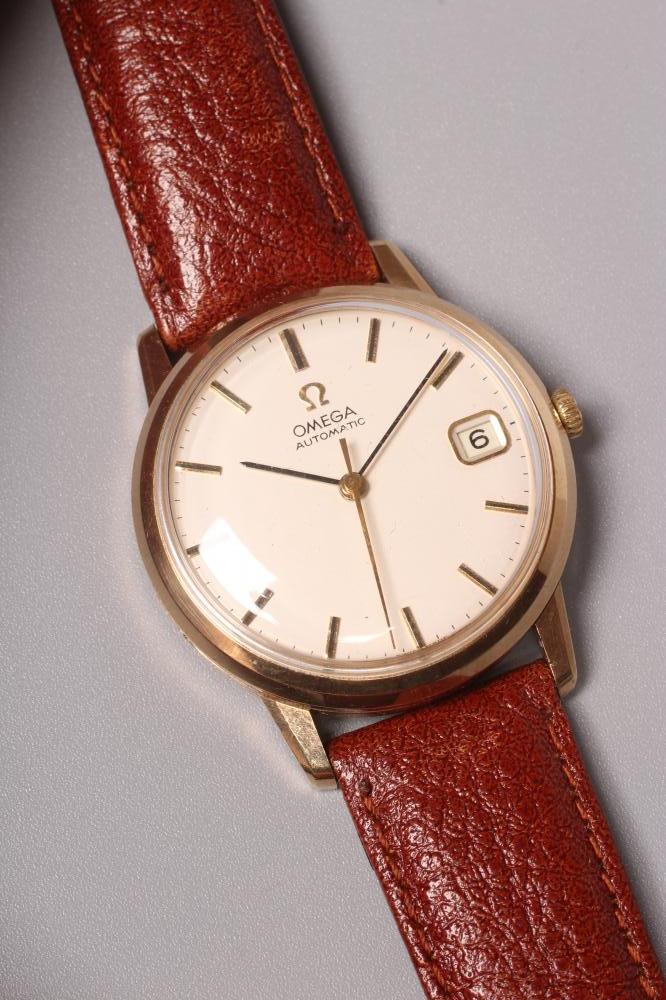 A GENTLEMAN'S 9CT GOLD OMEGA AUTOMATIC WRISTWATCH Image