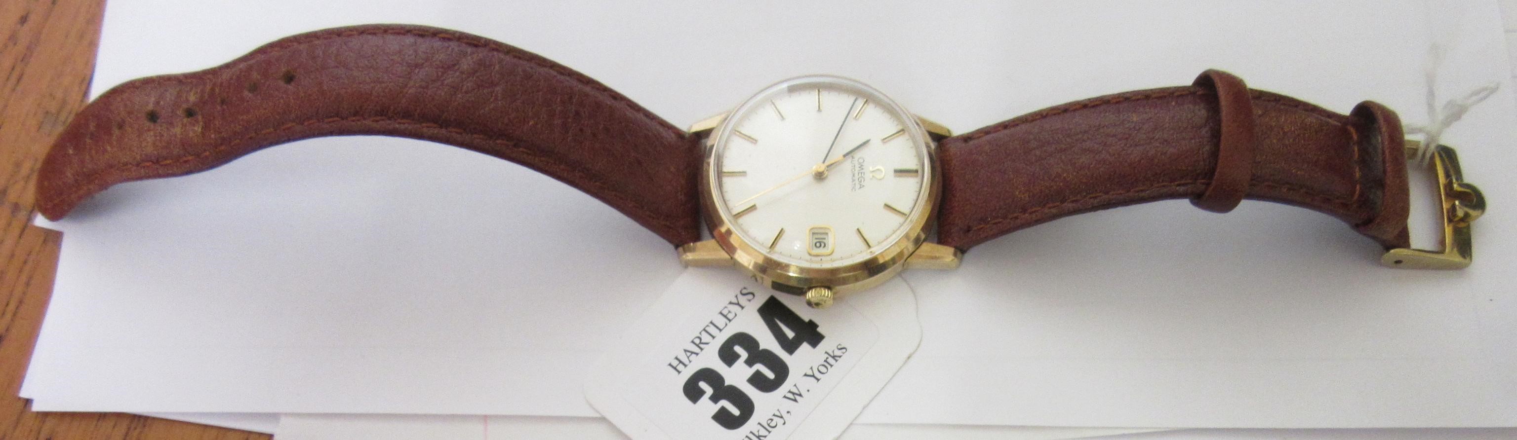 A GENTLEMAN'S 9CT GOLD OMEGA AUTOMATIC WRISTWATCH Image
