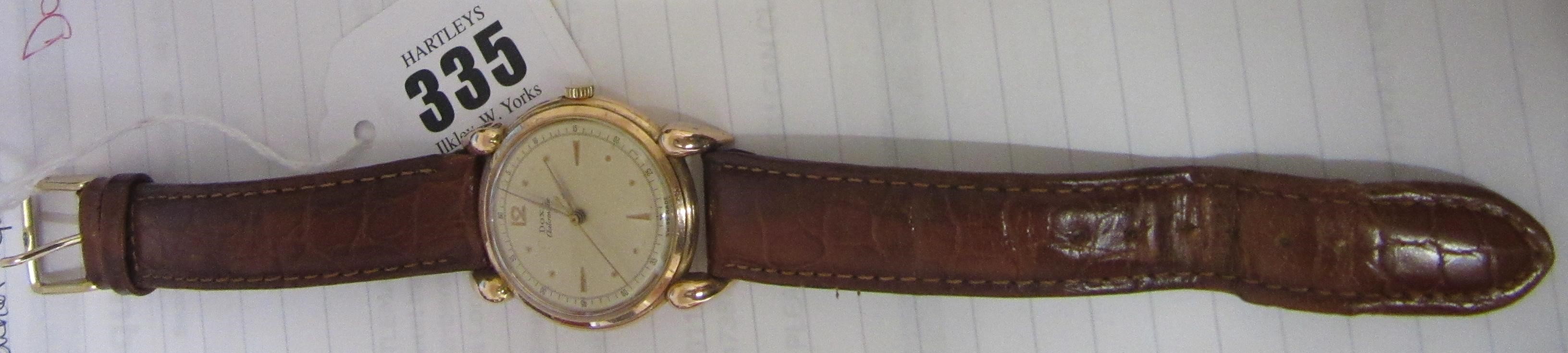 A GENTLEMAN'S 14CT GOLD DOXA AUTOMATIC WRISTWATCH Image