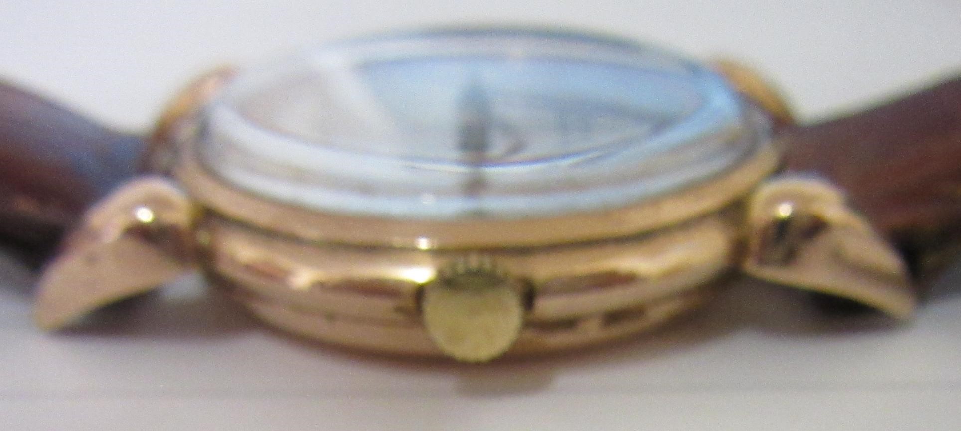 A GENTLEMAN'S 14CT GOLD DOXA AUTOMATIC WRISTWATCH Image