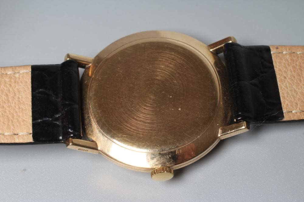 A GENTLEMAN'S 9CT GOLD TISSOT WRISTWATCH, the silvered dial with applied gold batons, date aperture Image