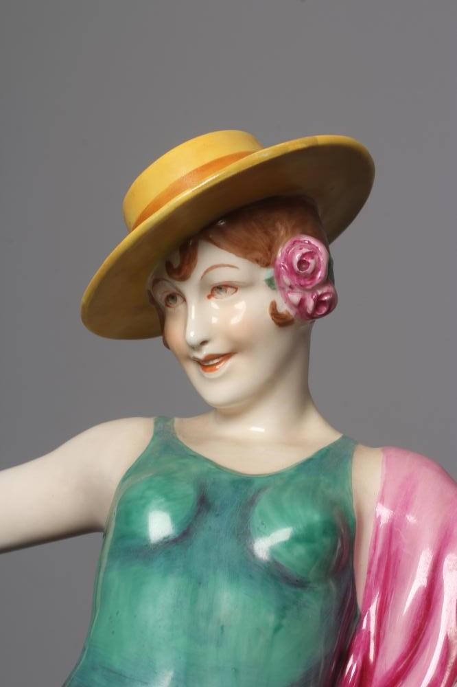 AN ART DECO ROYAL DUX FIGURE modelled as a female Spanish dancer wearing a cordovan hat Image
