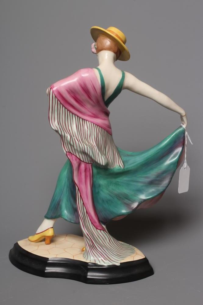 AN ART DECO ROYAL DUX FIGURE modelled as a female Spanish dancer wearing a cordovan hat Image