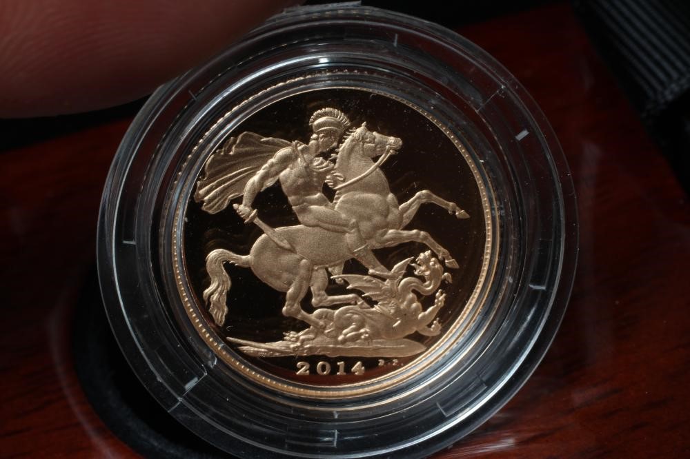 AN ELIZABETH II PROOF SOVEREIGN, 2014, in capsule, cased and boxed with certificate numbered 2692 Image