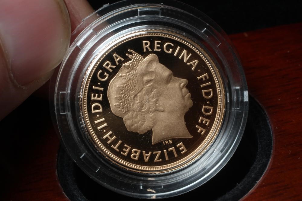 AN ELIZABETH II PROOF SOVEREIGN, 2014, in capsule, cased and boxed with certificate numbered 2692 Image