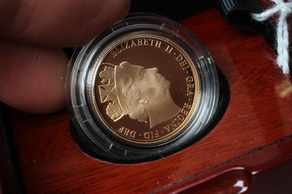AN ELIZABETH II PROOF SOVEREIGN, 2016, in capsule, cased and boxed with certificate numbered 1975 Image