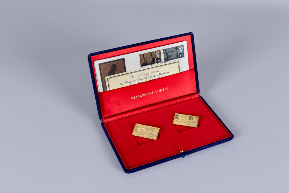 A SET OF TWO 18CT GOLD SIR WINSTON CHURCHILL REPLICA STAMPS comprising 1/- 3d (weighing 20.2g) and Image