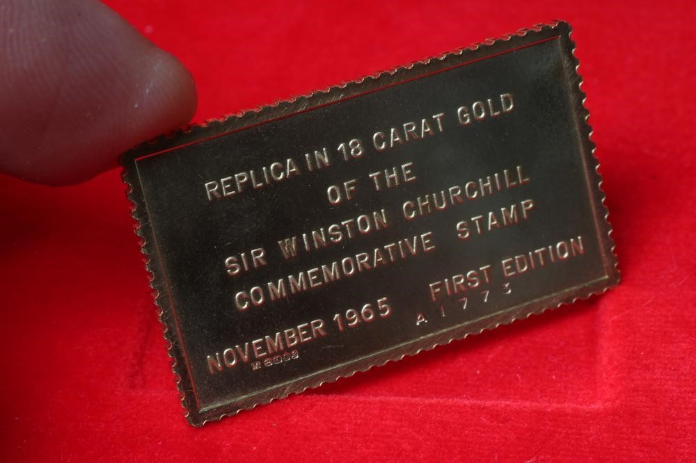 A SET OF TWO 18CT GOLD SIR WINSTON CHURCHILL REPLICA STAMPS comprising 1/- 3d (weighing 20.2g) and Image