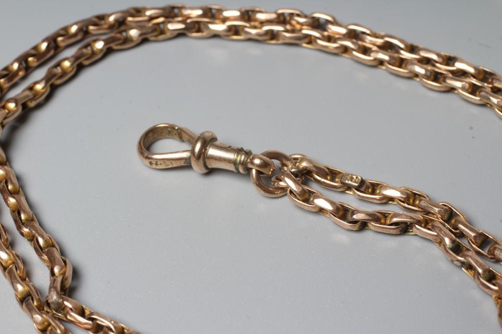 A GUARD CHAIN with faceted belcher links and dog-clip fastener, fastener stamped 9ct and small Image