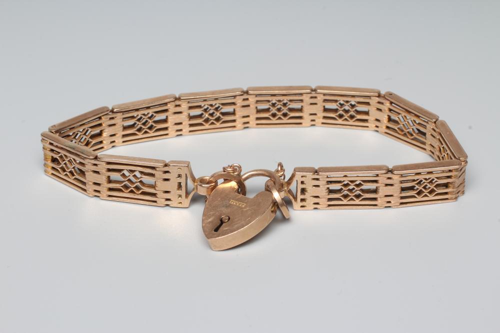 A LATE VICTORIAN FANCY GATE LINK BRACELET stamped 9ct, sponsor Charles Daniel Broughton, with Image