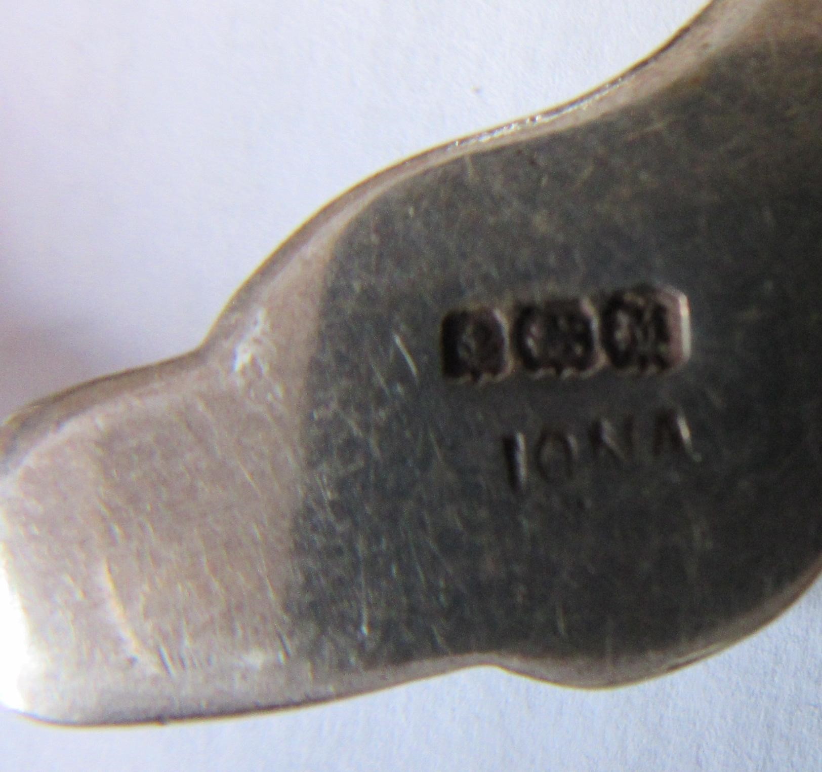 OF SCOTTISH INTEREST - A silver Iona Celtic Art plaid pin with animal head terminals Image