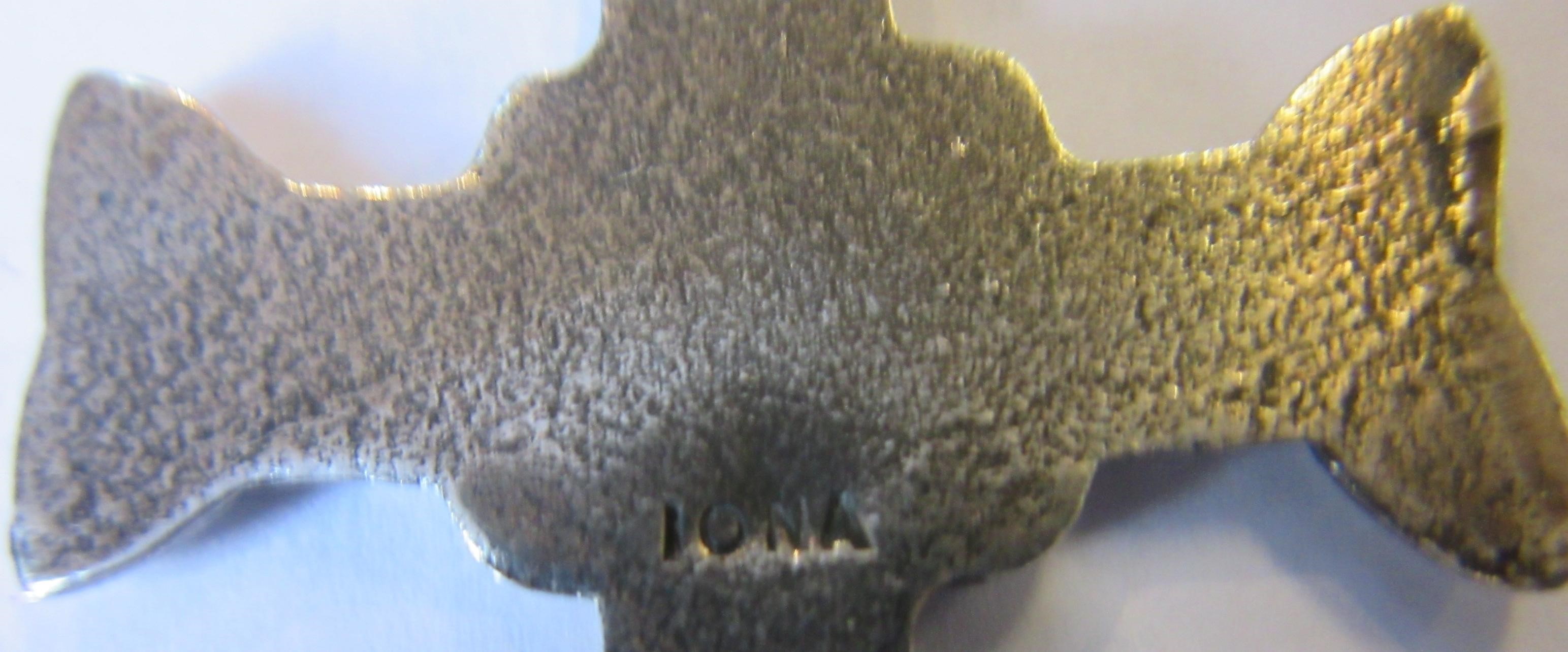 OF SCOTTISH INTEREST - A silver Iona Celtic Art plaid pin with animal head terminals Image