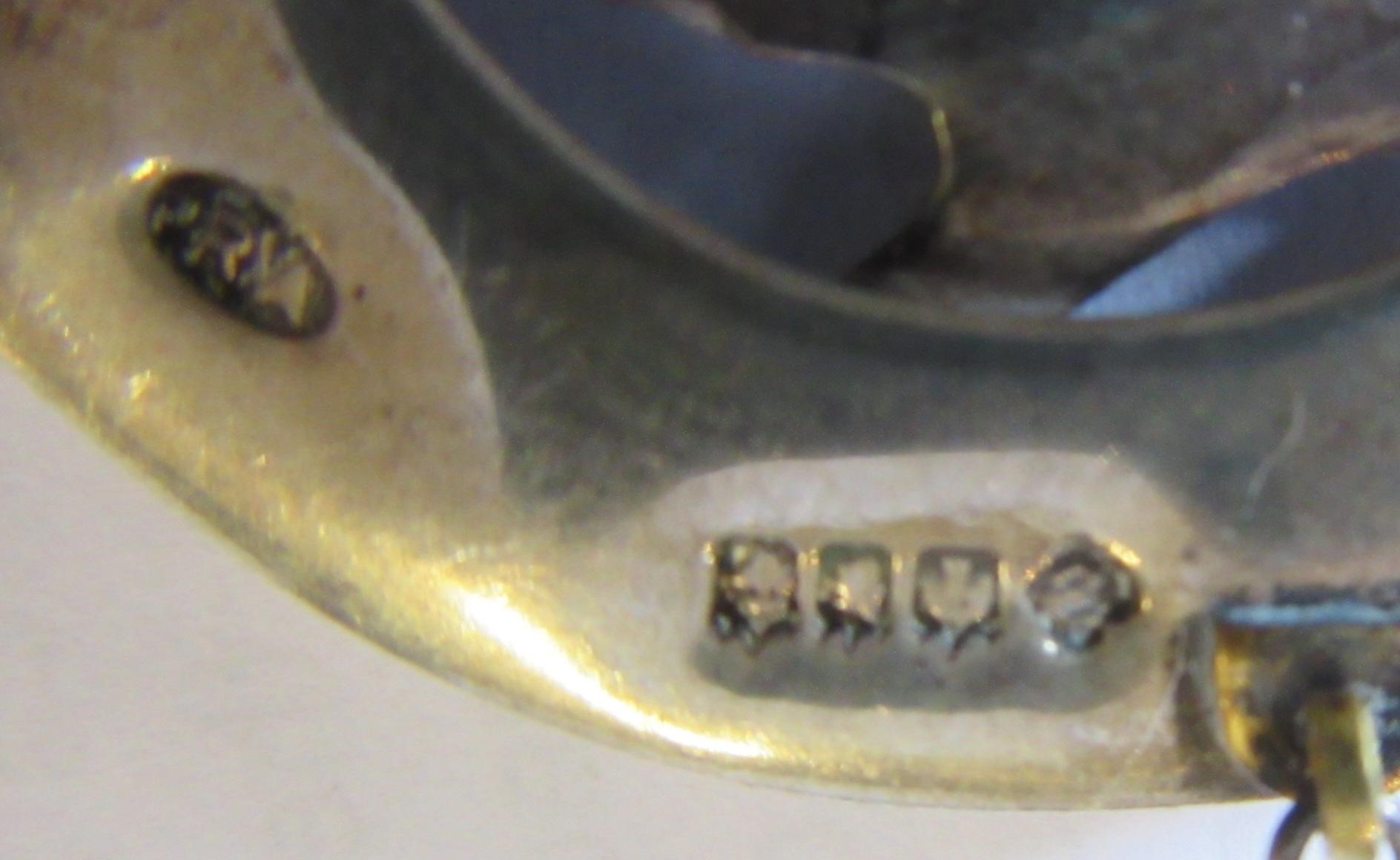 OF SCOTTISH INTEREST - A silver Iona Celtic Art plaid pin with animal head terminals Image