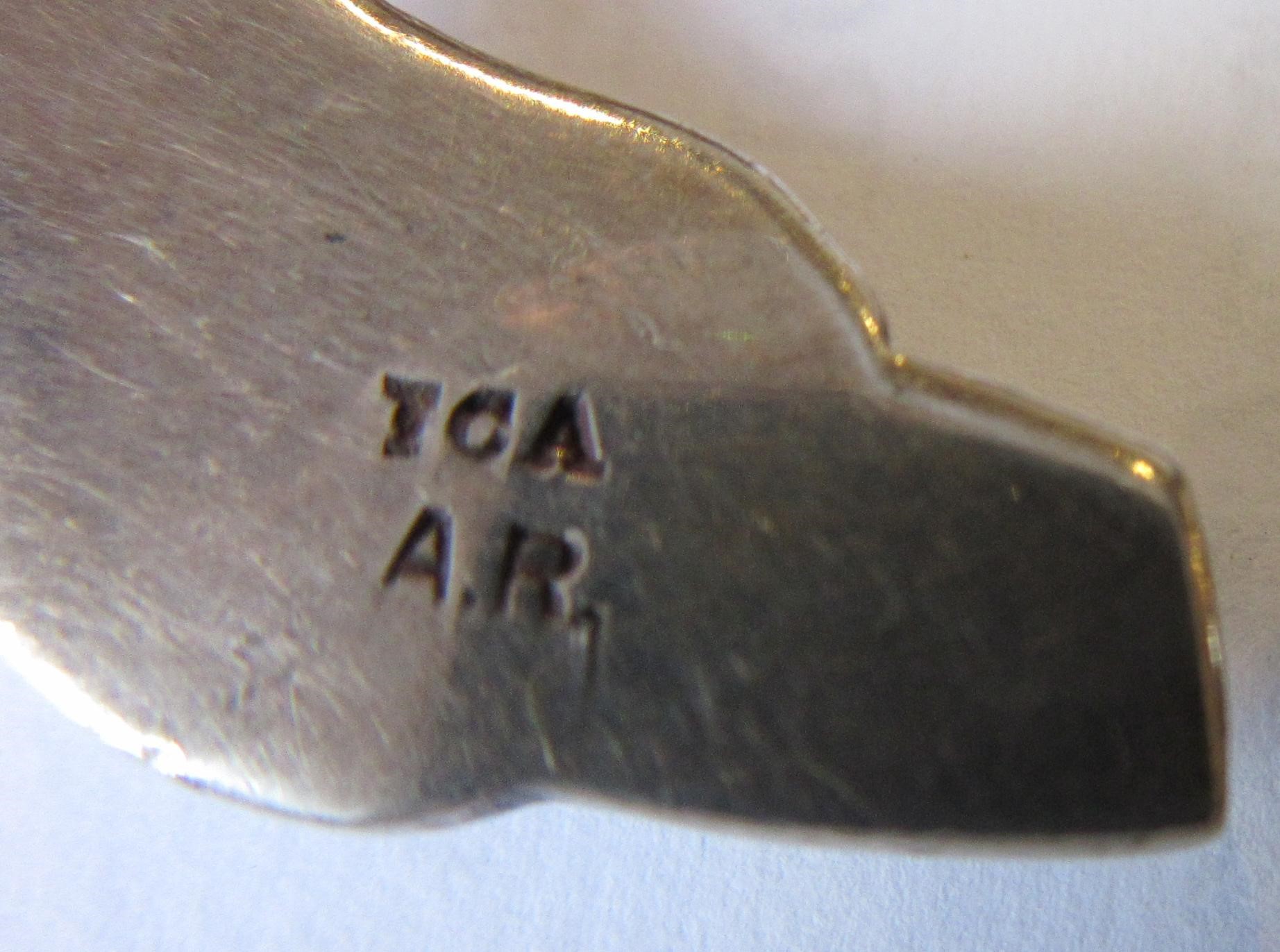 OF SCOTTISH INTEREST - A silver Iona Celtic Art plaid pin with animal head terminals Image
