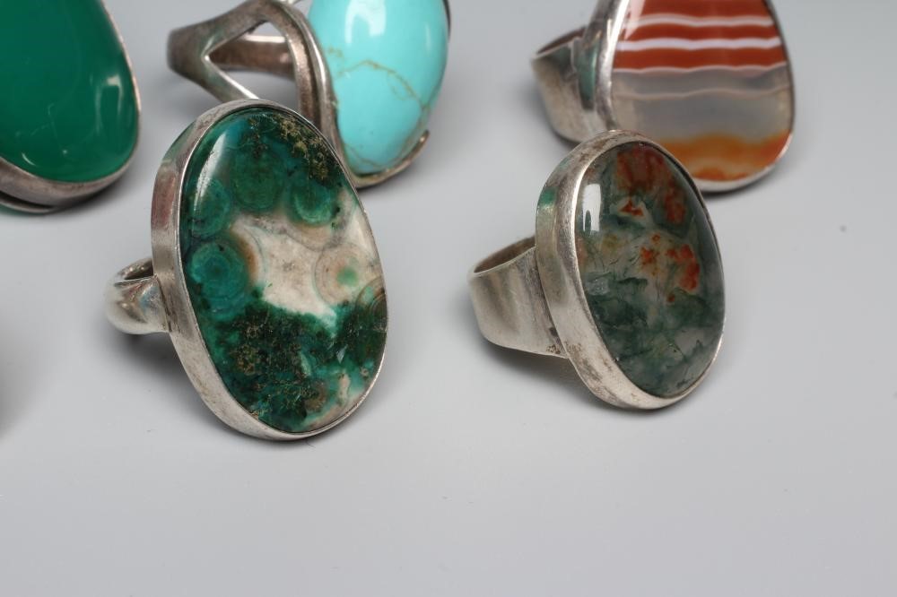 OF SCOTTISH INTEREST - THREE SILVER RINGS all set with polished hardstones Image