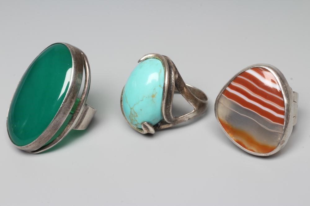 OF SCOTTISH INTEREST - THREE SILVER RINGS all set with polished hardstones Image